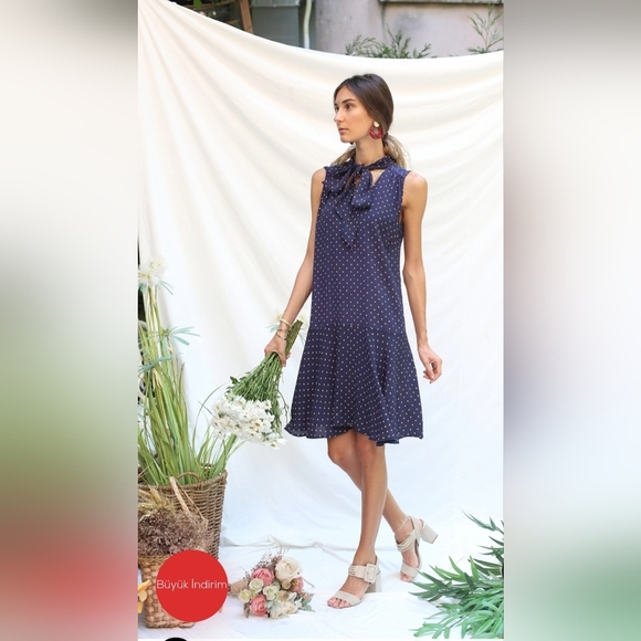 Chic Navy Polka Dot Mini Dress - Picture 3 of 11